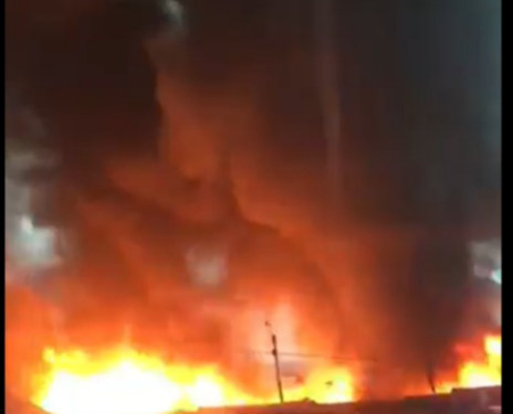 GNFS struggles to contain a large fire at a rubber factory in Circle as heavy rainfall disrupts firefighting efforts.